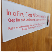 LOCAL LAW 115 FDNY FIRE DOOR SIGN - ACRYLIC